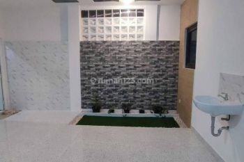 Rumah di tengah kota