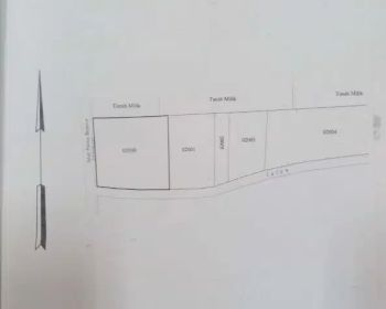 Dijual tanah jalan utama berawa di seberang atlas